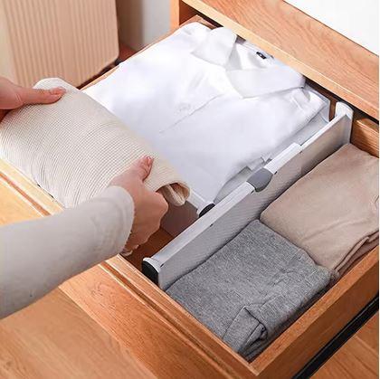 Obrázek z Nastavitelný rozdělovač/přepážka do zásuvky